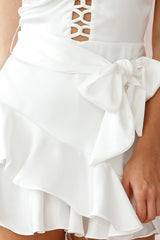 Wishful Thinking Plunging Neckline Ruffle Hem Romper White